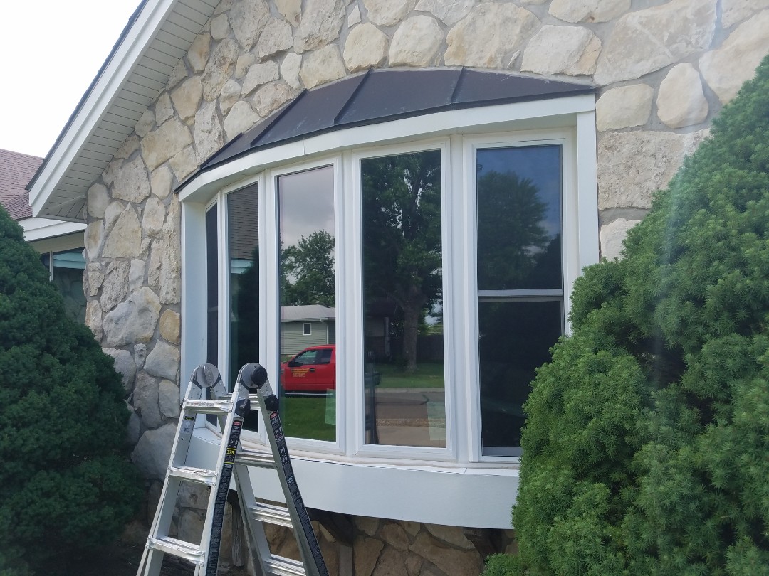 Victoria, KS - This old bay window will be soon getting a face lift including a new copper standing seam roof. This material is durable and will provide a stylish look to this beautiful home. Victoria, KS - This old bay window will be soon getting a face lift including a new copper standing seam roof. This material is durable and will provide a stylish look to this beautiful home.