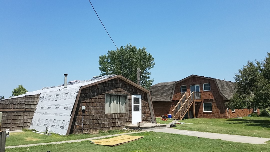 Grinnell, KS - Finishing up a installation of Tamko shingles on this home. These mansard roofs are challenging but count on Roofmasters to get the job done professionally and promptly. Grinnell, KS - Finishing up a installation of Tamko shingles on this home. These mansard roofs are challenging but count on Roofmasters to get the job done professionally and promptly.