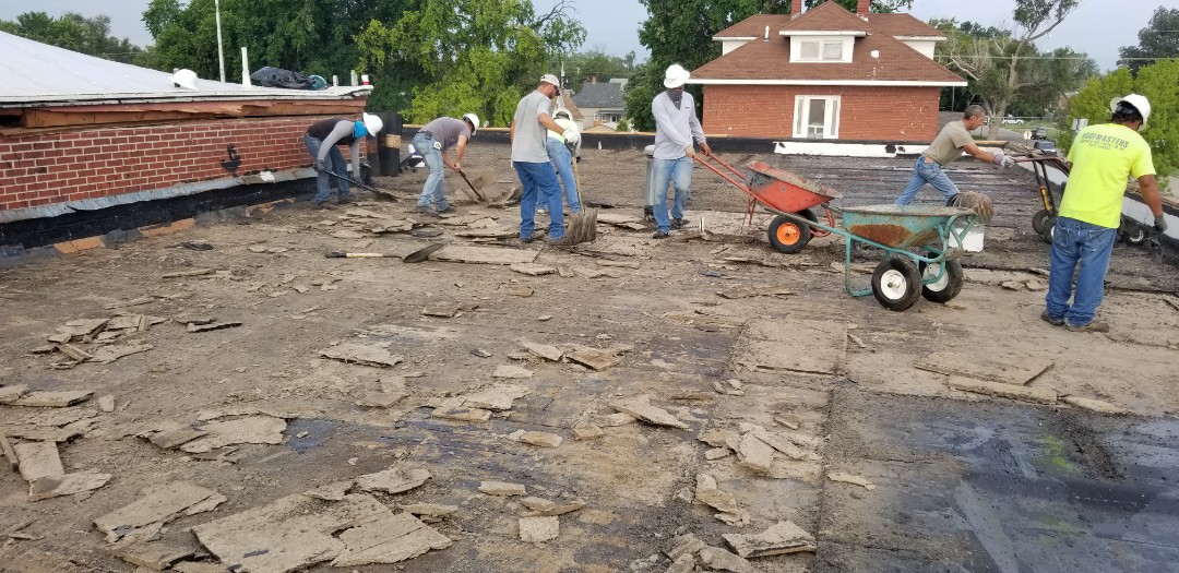 Hays, KS - Emergency roof removal at St Mary's. Microburst rips roof of the building! Hays, KS - Emergency roof removal at St Mary's. Microburst rips roof of the building!