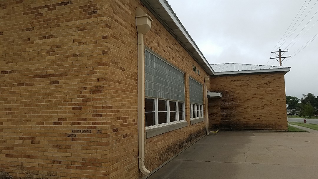 La Crosse, KS - This building is in need of guttering to divert the rain away from the building. Commercial box style guttering will be a perfect fit for this old building. La Crosse, KS - This building is in need of guttering to divert the rain away from the building. Commercial box style guttering will be a perfect fit for this old building.