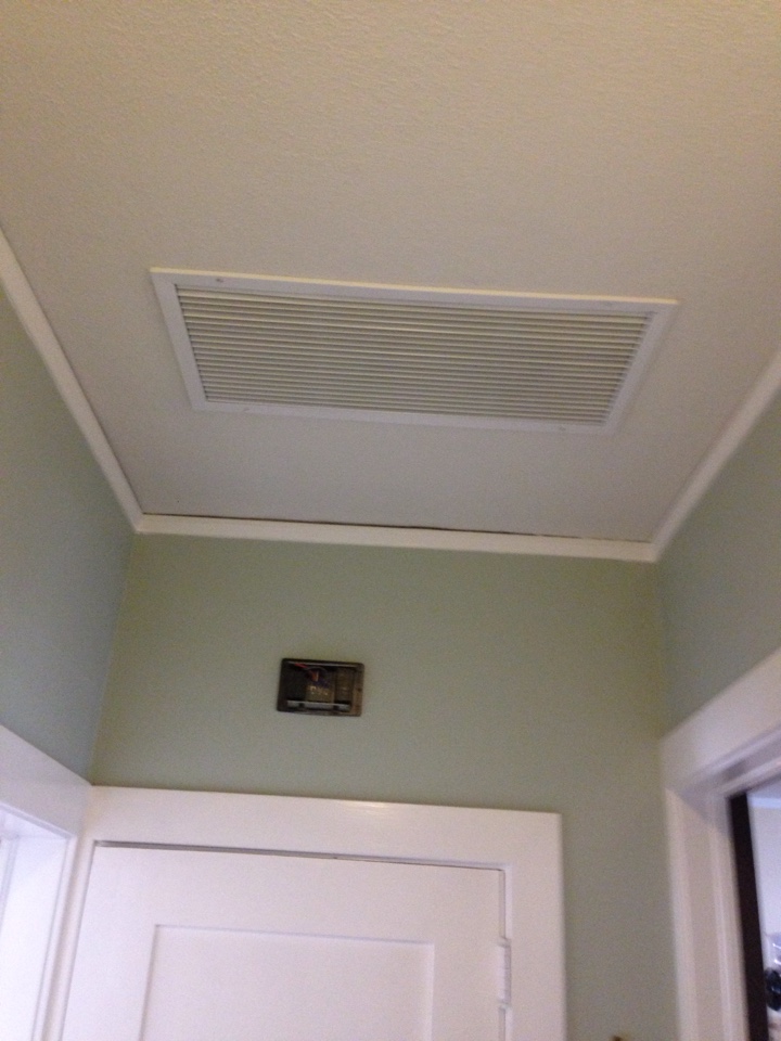 Pasadena, CA - Installing new return register in hallway for new BRYANT system 