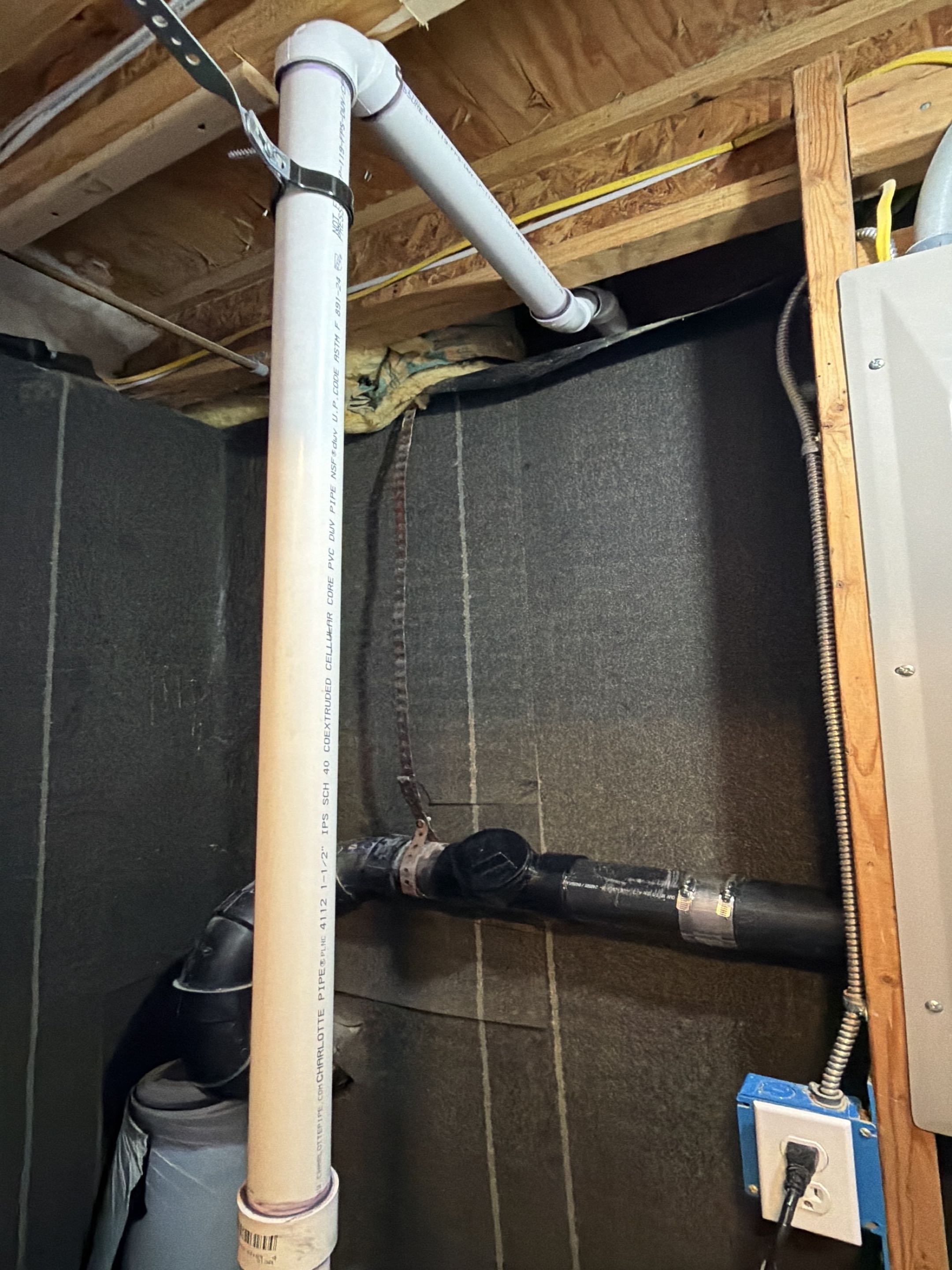 Sump pump was tied into the main sewer line causing sore gas odors re-piped to the outside and connected drain