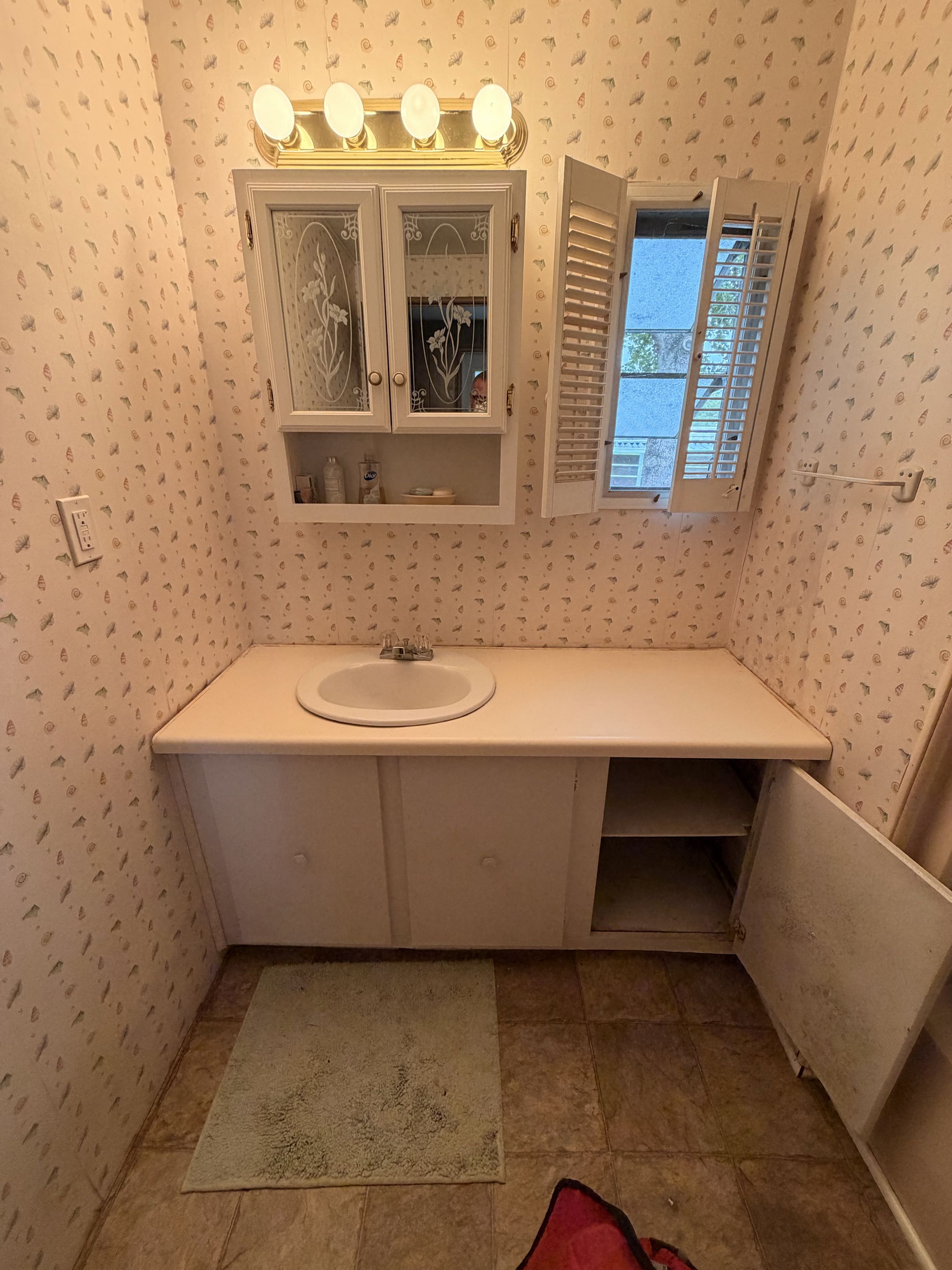 Completed final phase of repipe and installation of new kitchen cabinets, top with a Kohler drop in oval sink and Moen Voss brushed nickel single lever faucet. 