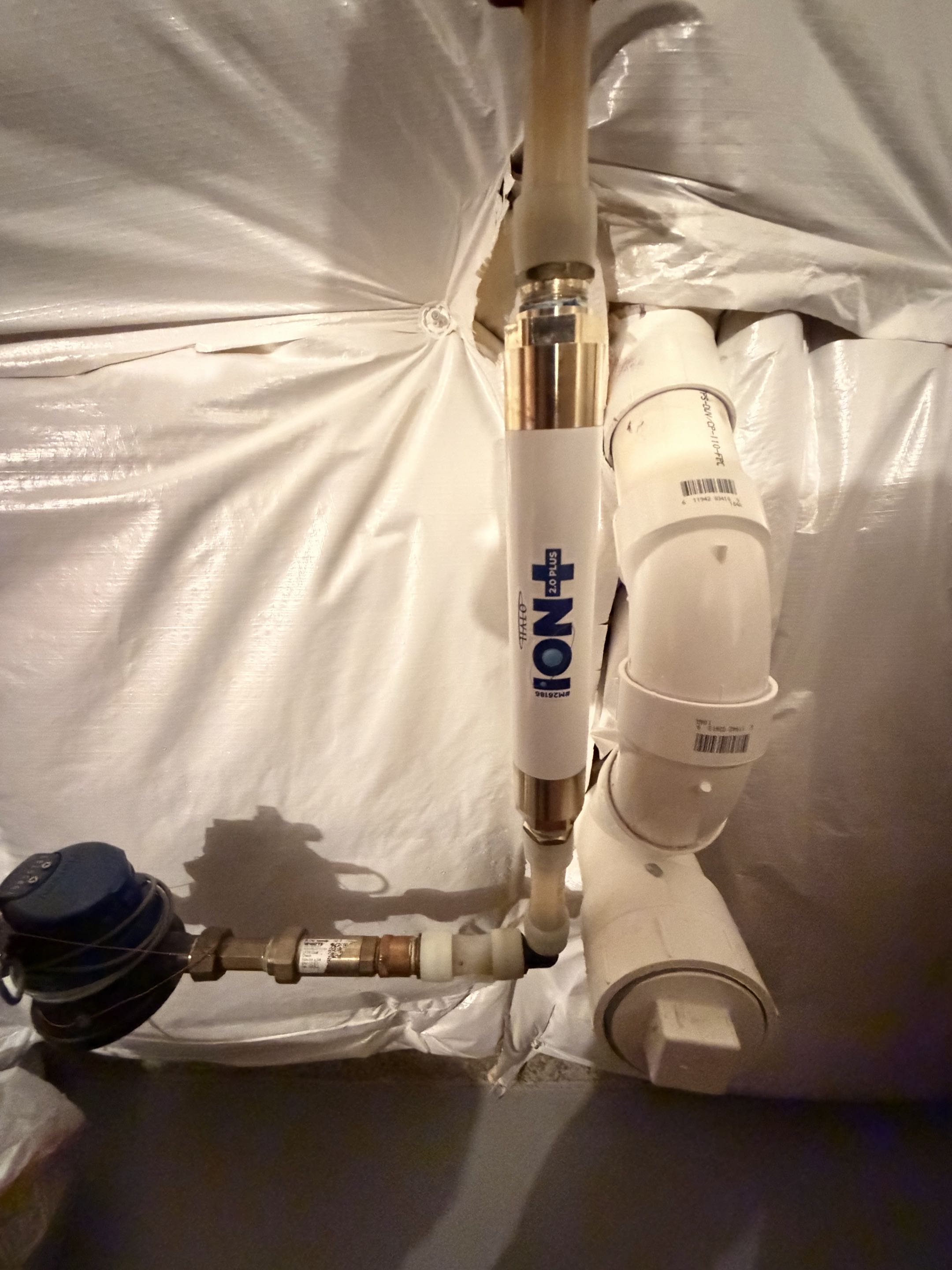 Finishing reseal and reset toilets, install new Moen cartridges and install a Halo ion 12 calcium remover system on water main. 