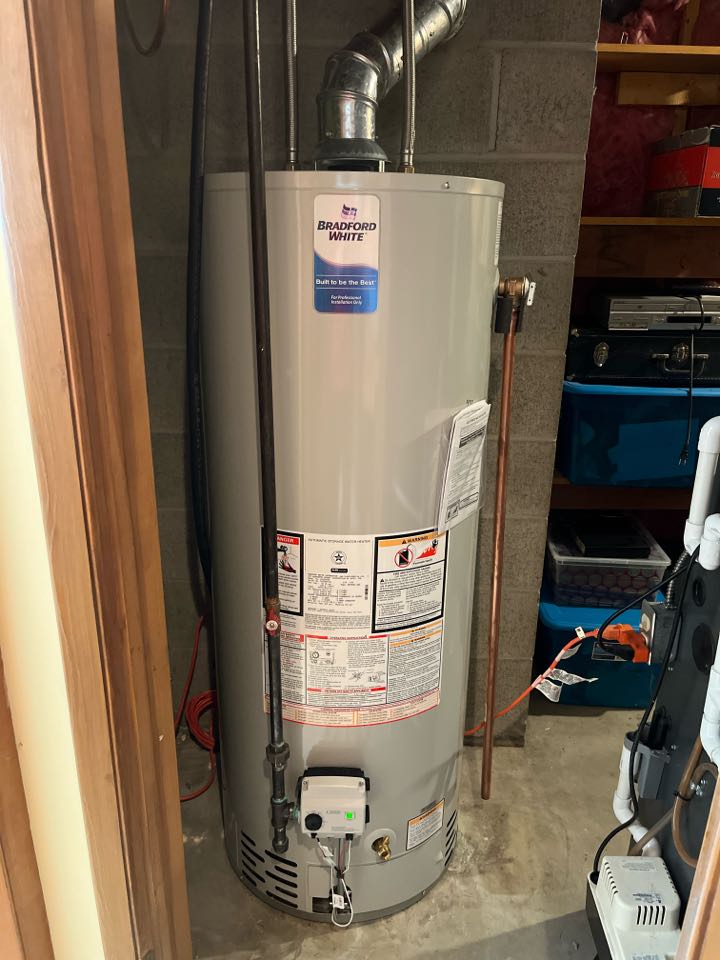 Replaced old water heater with a new 50 gallon Bradford White atmospheric water heater.  Replaced old water heater with a new 50 gallon Bradford White atmospheric water heater.