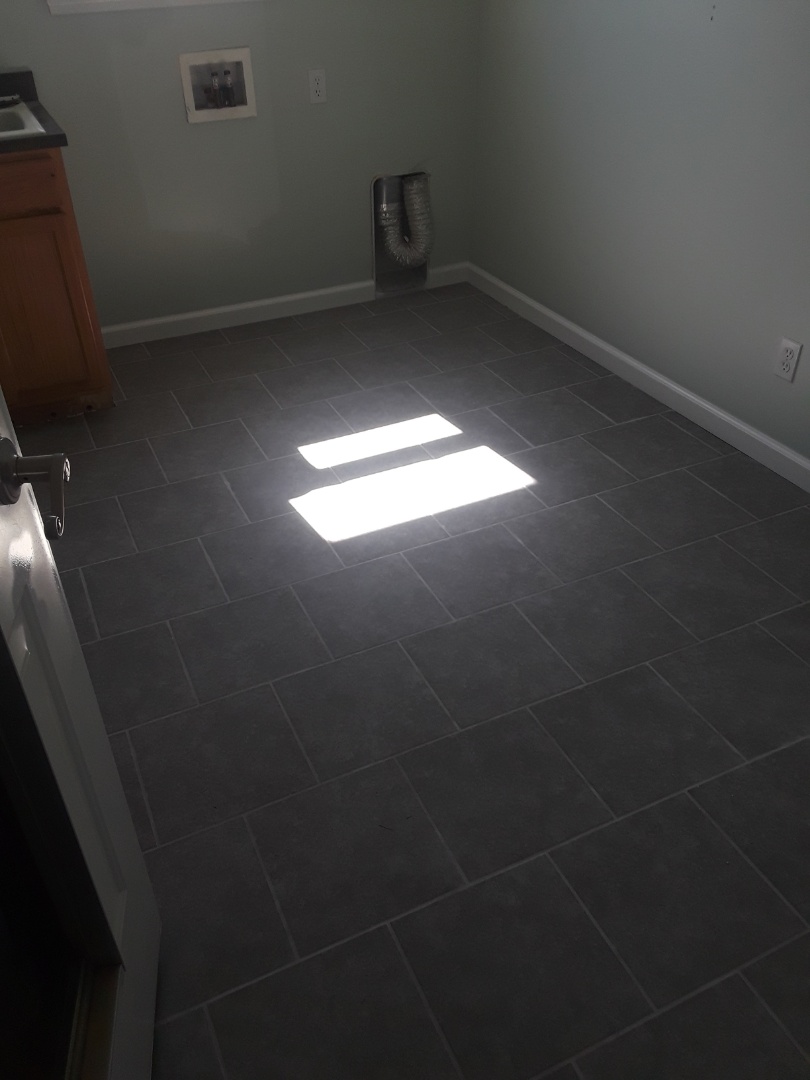 Allendale Charter Township, MI - Again, lousy picture, but the laundry room project is complete. I buffed the tile clean, installed the base molding, caulked, filled and touched up the paint. The homeowners are very happy with the timeline and quality of the job ?? Allendale Charter Township, MI - Again, lousy picture, but the laundry room project is complete. I buffed the tile clean, installed the base molding, caulked, filled and touched up the paint. The homeowners are very happy with the timeline and quality of the job ??