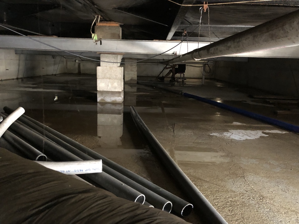 Holland, MI - Water extraction from crawl space. Setting up drying equipment. Treat the floor with micro an Holland, MI - Water extraction from crawl space. Setting up drying equipment. Treat the floor with micro an