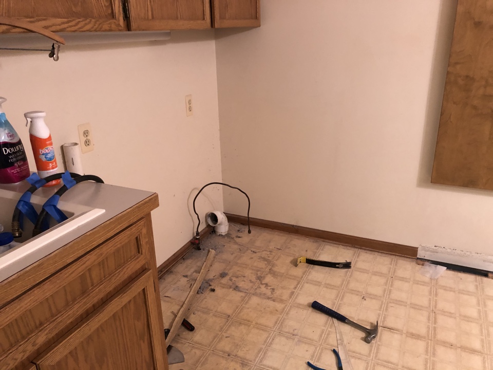 Georgetown Township, MI - Removed washer and dryer to install new vinyl plank flooring in the laundry room. Install in progress after floor prep Georgetown Township, MI - Removed washer and dryer to install new vinyl plank flooring in the laundry room. Install in progress after floor prep