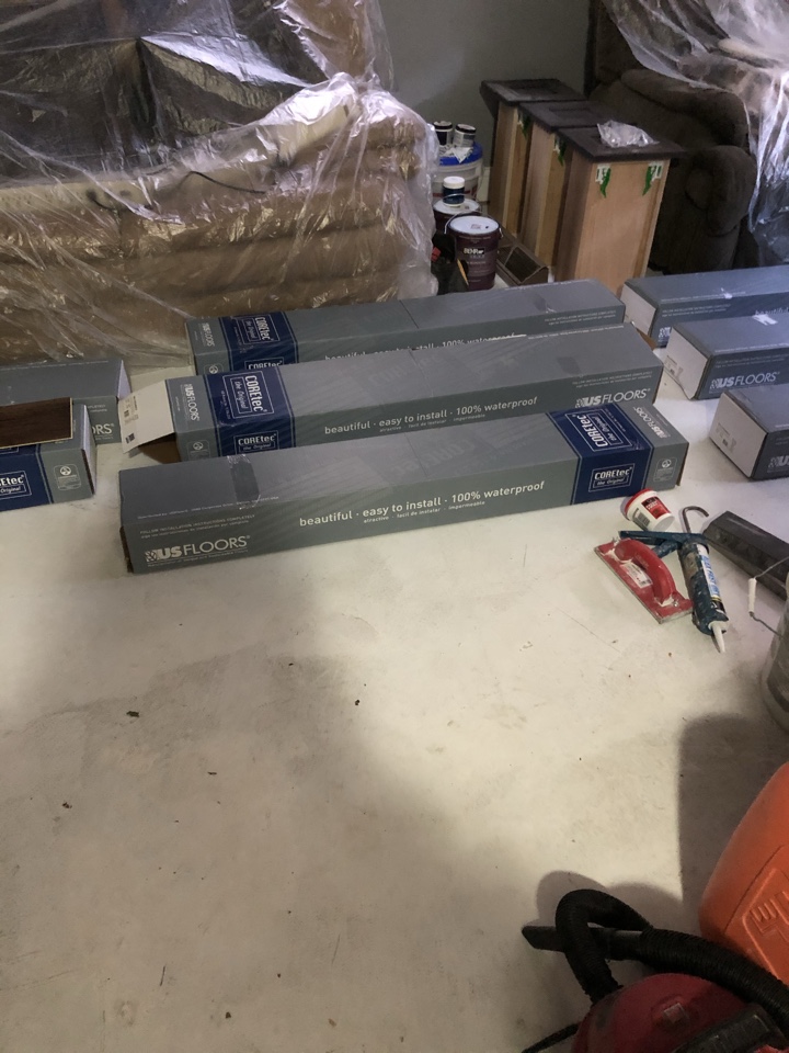 Wyoming, MI - Getting ready to install vinyl plank in the living room. Moving the content out and start to square up the room. Wyoming, MI - Getting ready to install vinyl plank in the living room. Moving the content out and start to square up the room.