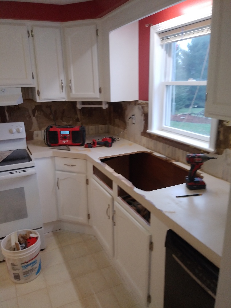Middleville, MI - Just finished the prep work for applying new Formica and tile backsplash. Patched and sealed the drywall. Patched and sanded existing countertop. Removed old sink and modified opening to fit the new sink Middleville, MI - Just finished the prep work for applying new Formica and tile backsplash. Patched and sealed the drywall. Patched and sanded existing countertop. Removed old sink and modified opening to fit the new sink