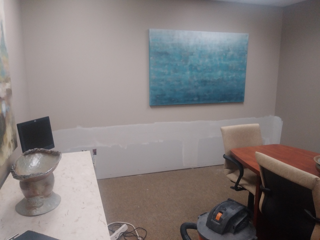 Grand Rapids, MI - Applied the 1st coat of mud to the drywall patch Grand Rapids, MI - Applied the 1st coat of mud to the drywall patch