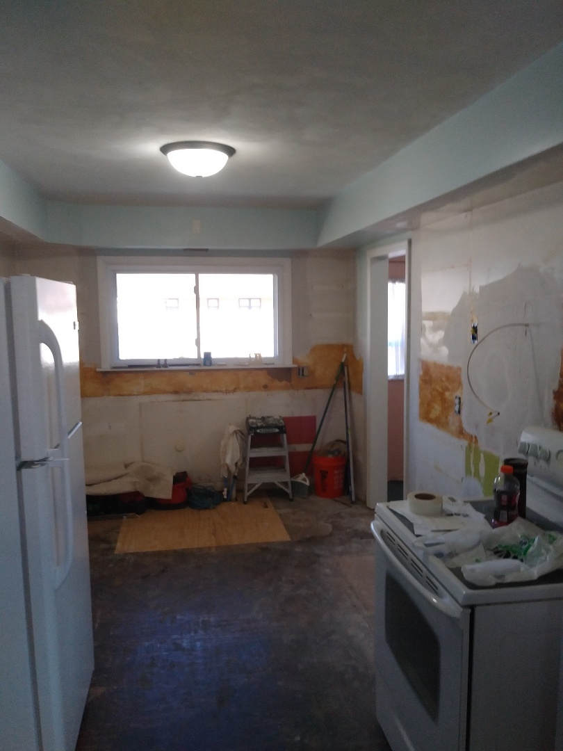 Holland, MI - Moving forward. Patched the floor which was rotten out due to leaky plumbing. Relocated 2 outlets that would have been half covered by the new cabinets. Removed "dead" vent snd wiring. Hung drywall where necessary and applied 1 coat of mud. Holland, MI - Moving forward. Patched the floor which was rotten out due to leaky plumbing. Relocated 2 outlets that would have been half covered by the new cabinets. Removed "dead" vent snd wiring. Hung drywall where necessary and applied 1 coat of mud.