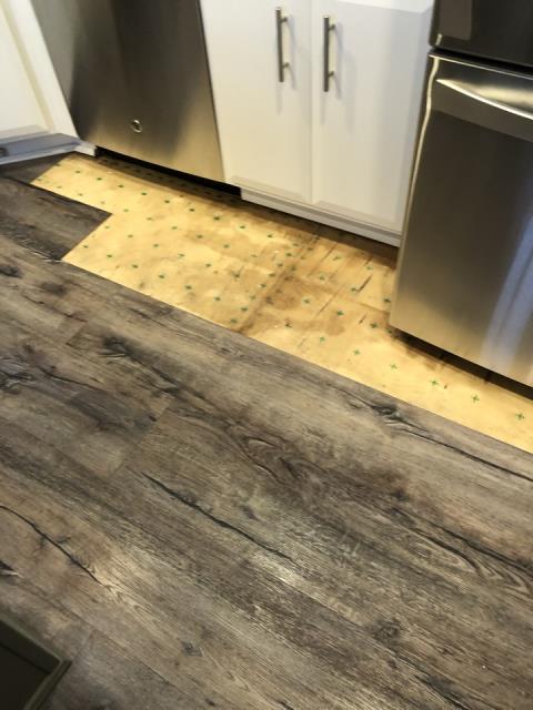 Grand Rapids, MI - Refrigerator line broke. Water restoration of vinyl plank and small area of drywall repair behind refrigerator Grand Rapids, MI - Refrigerator line broke. Water restoration of vinyl plank and small area of drywall repair behind refrigerator