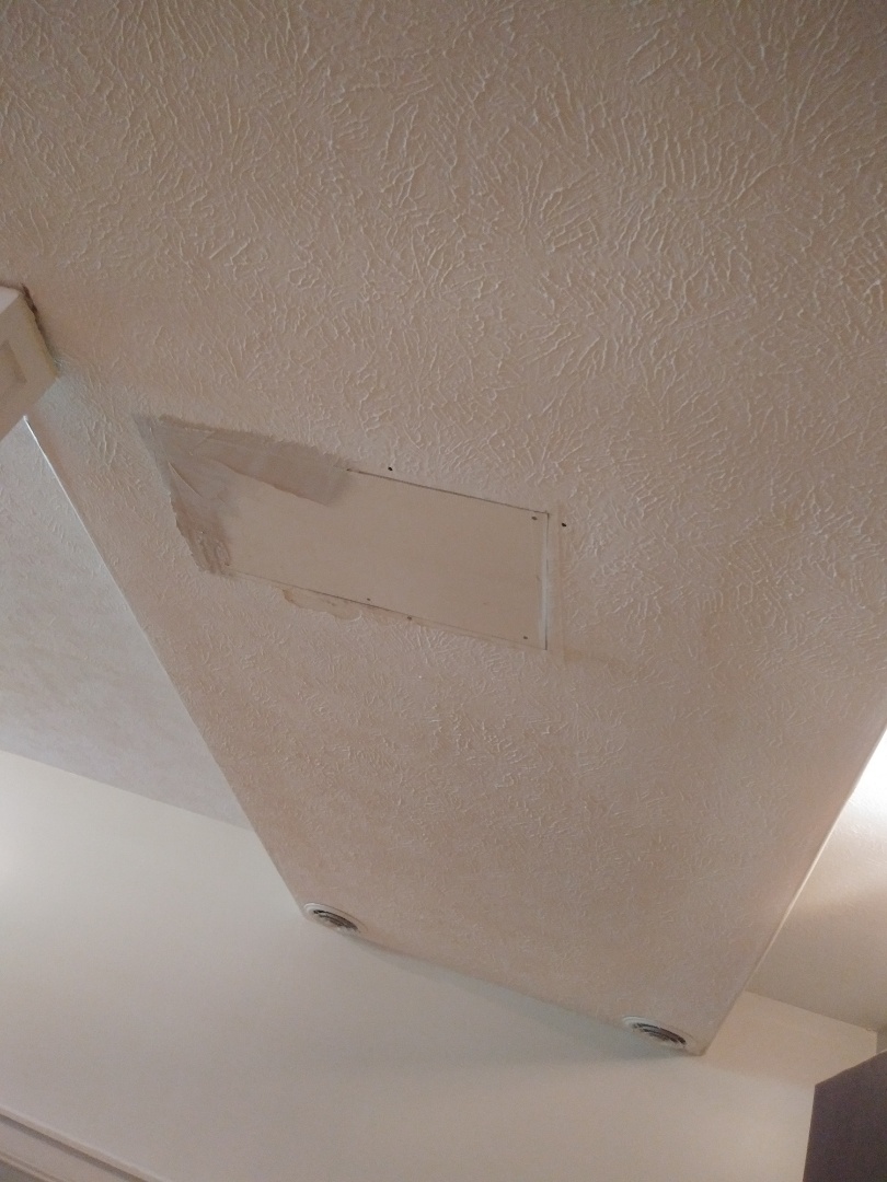 Rockford, MI - A hole was cut in the ceiling to patch a leaking pipe. I replaced the jagged and damaged drywall and am applying the 1st coat of mud. Rockford, MI - A hole was cut in the ceiling to patch a leaking pipe. I replaced the jagged and damaged drywall and am applying the 1st coat of mud.
