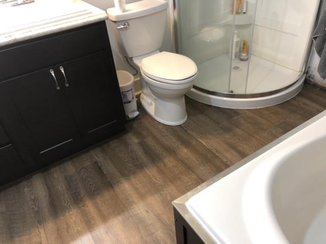 Grandville, MI - Basement bathroom. Shower leaked damage to drywall and baseboards in the bathroom. Grandville, MI - Basement bathroom. Shower leaked damage to drywall and baseboards in the bathroom.