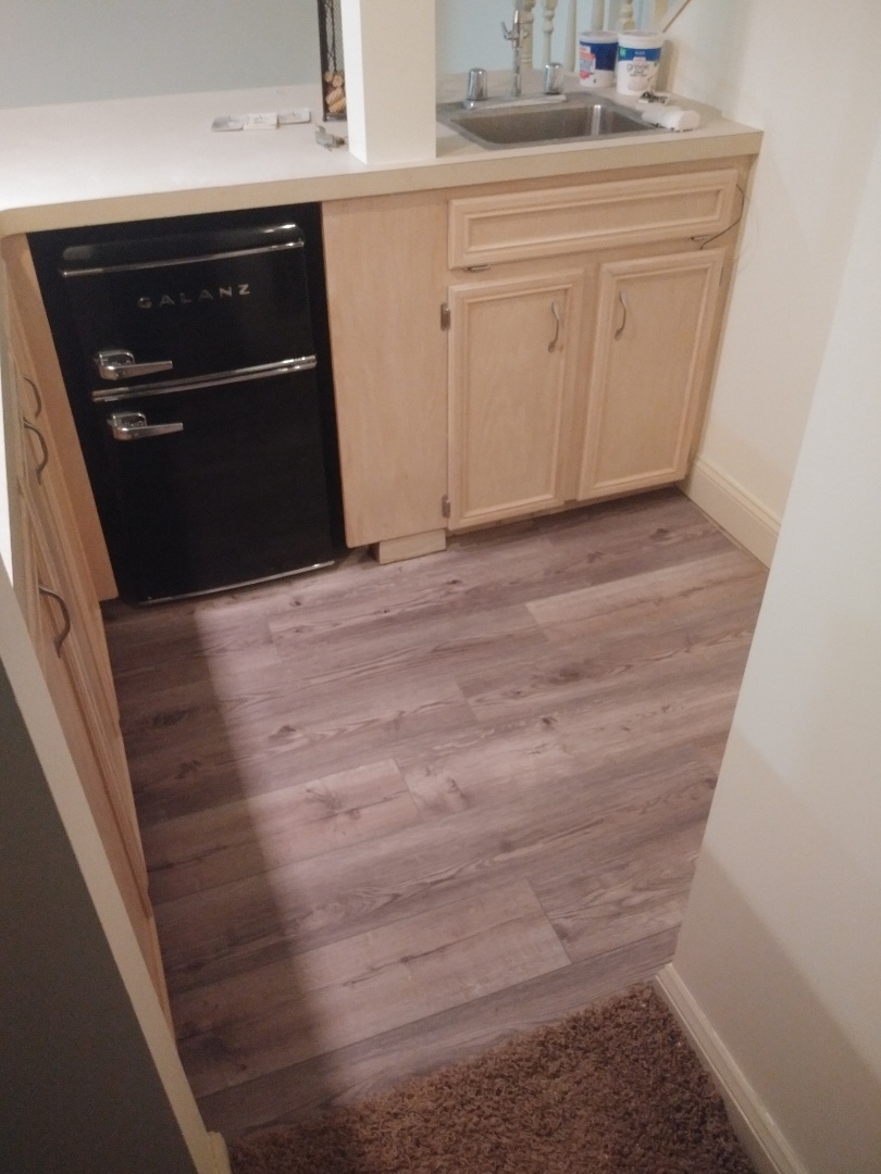 Hudsonville, MI - The prep work is done and the new vinyl plank floor is installed Hudsonville, MI - The prep work is done and the new vinyl plank floor is installed