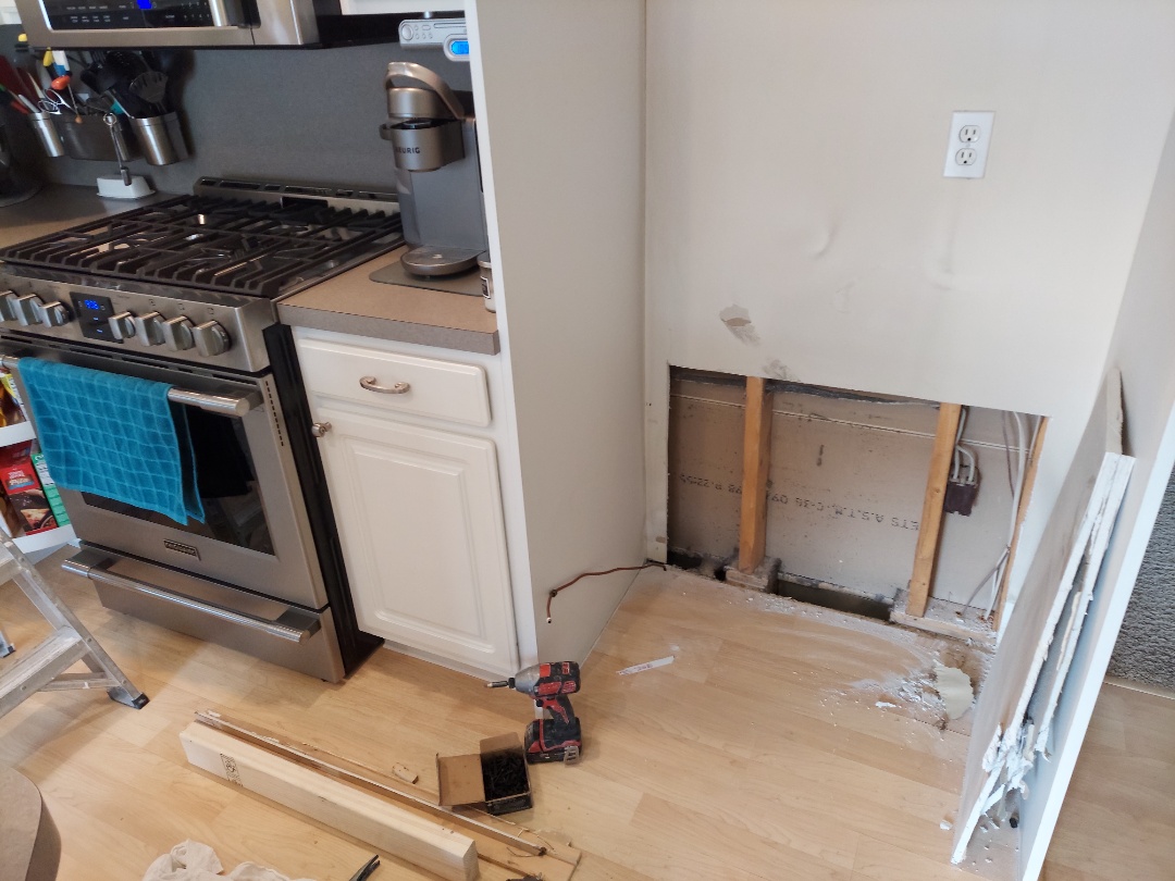 Byron Center, MI - Repairing damage caused by a leaking refrigerator. Byron Center, MI - Repairing damage caused by a leaking refrigerator.