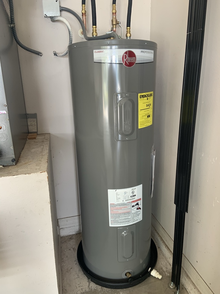 Palm City, FL - Installed a new Rheem 50 gallon tall profile water heater with a valve and flexible union connections. Palm City, FL - Installed a new Rheem 50 gallon tall profile water heater with a valve and flexible union connections.