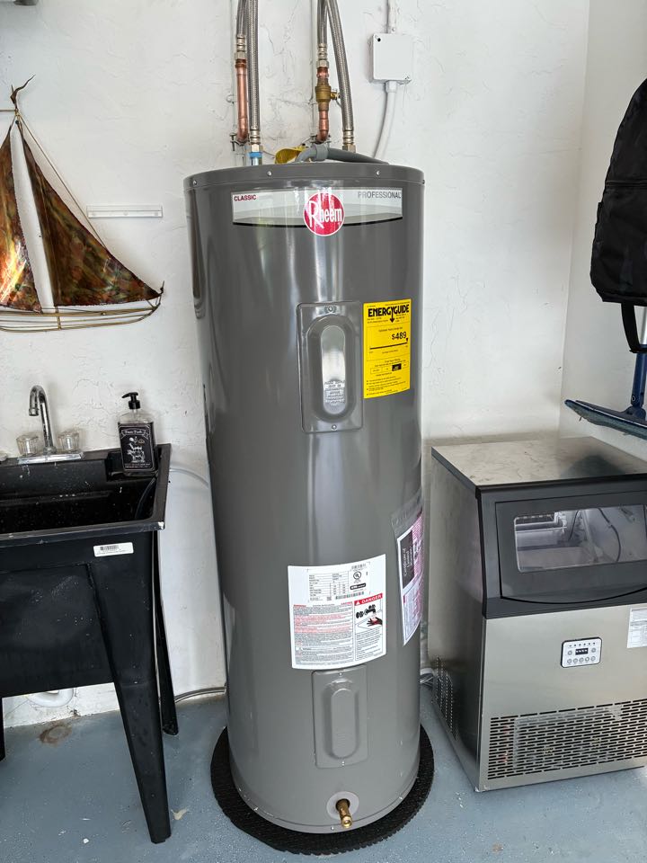 Palm City, FL - Installed a new Rheem 50 gallon tall profile water heater with a tank cushion, valve, flexible union connectors and various fittings and pipe. Palm City, FL - Installed a new Rheem 50 gallon tall profile water heater with a tank cushion, valve, flexible union connectors and various fittings and pipe.