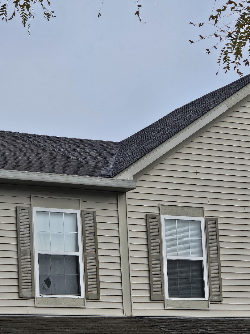 New O.C. Duration Driftwood architectural shingles on duplex