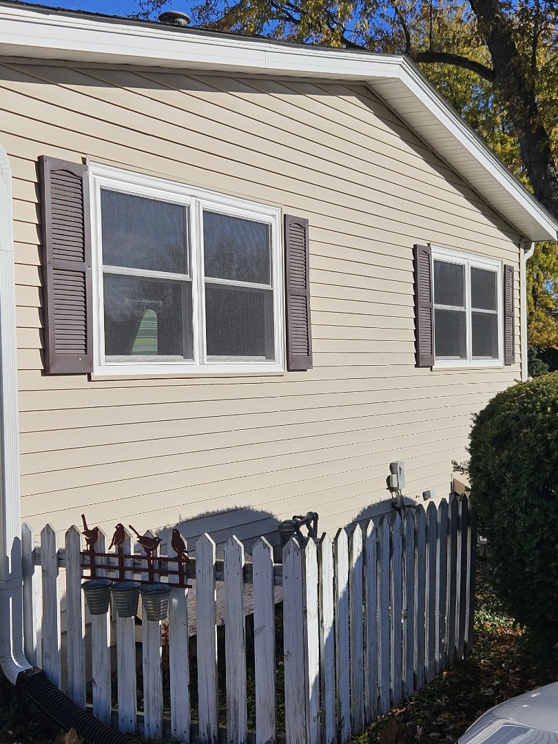 New White Vinyl Lindsay double hung windows installed