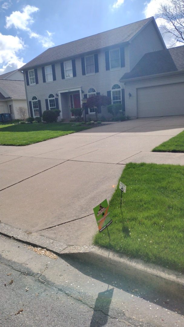 applying crabgrass control 