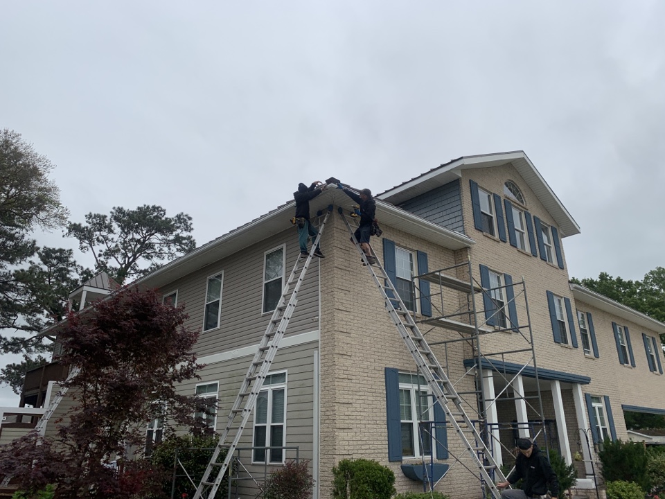 Norfolk, VA - Installing new LeafGuard gutters. Norfolk, VA - Installing new LeafGuard gutters.