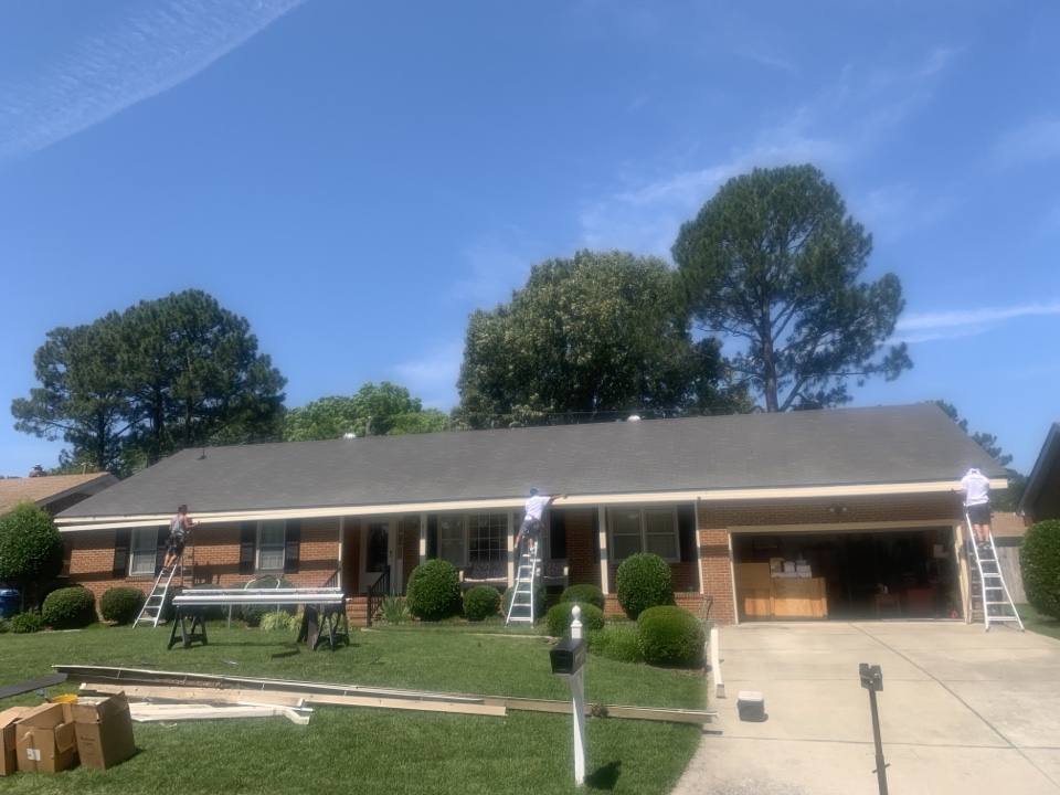 Virginia Beach, VA - Installing a 80ft piece of LeafGuard gutter. Virginia Beach, VA - Installing a 80ft piece of LeafGuard gutter.