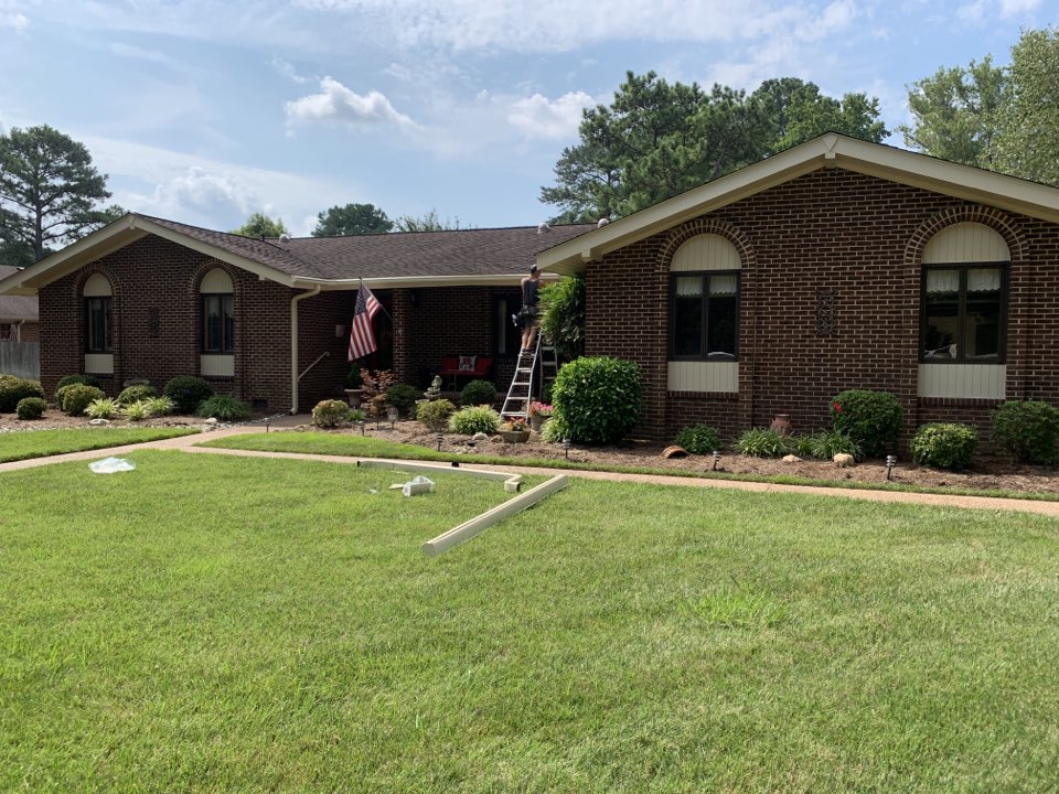 Virginia Beach, VA - Installing new LeafGuard gutters. Virginia Beach, VA - Installing new LeafGuard gutters.