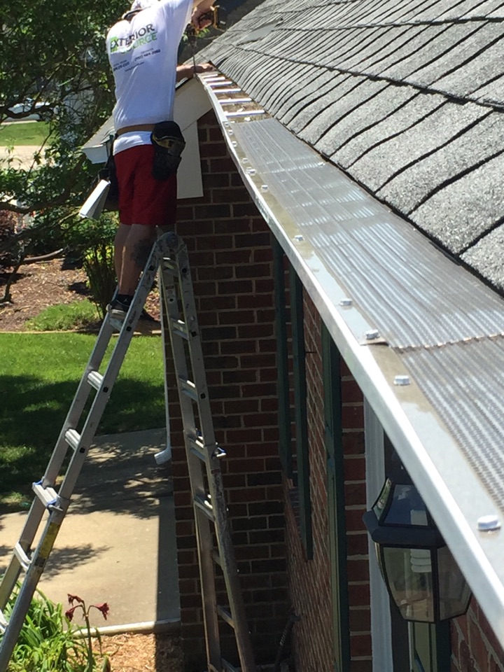 Chesapeake, VA - Installing 5" K-Style gutters with MicroGuard. Chesapeake, VA - Installing 5" K-Style gutters with MicroGuard.