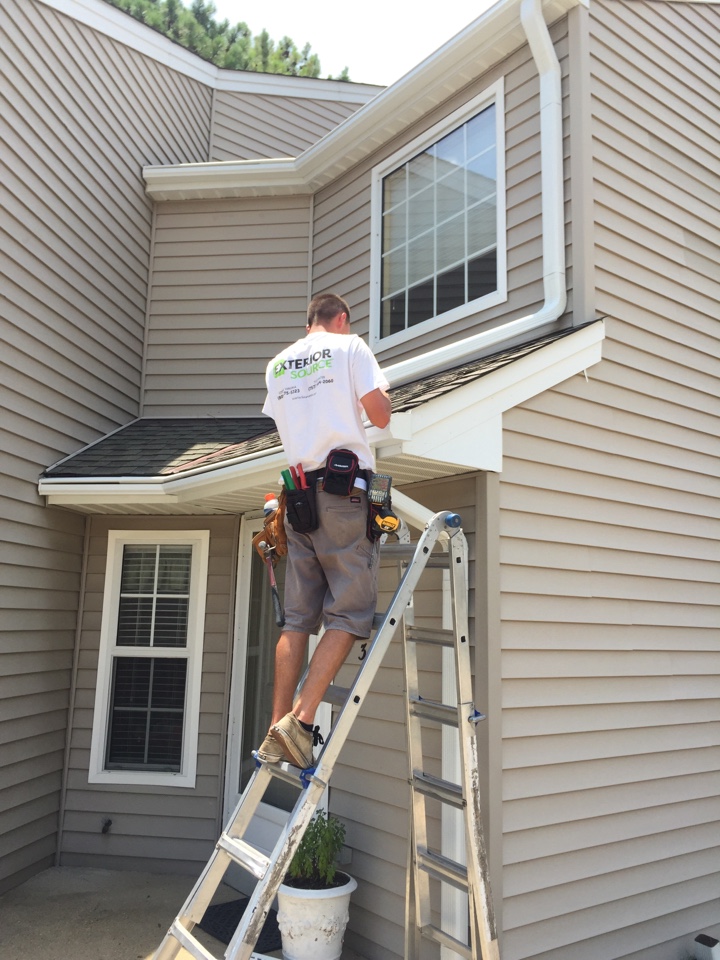 Virginia Beach, VA - Installing LeafGuard gutters . Putting in a hood tap. Virginia Beach, VA - Installing LeafGuard gutters . Putting in a hood tap.