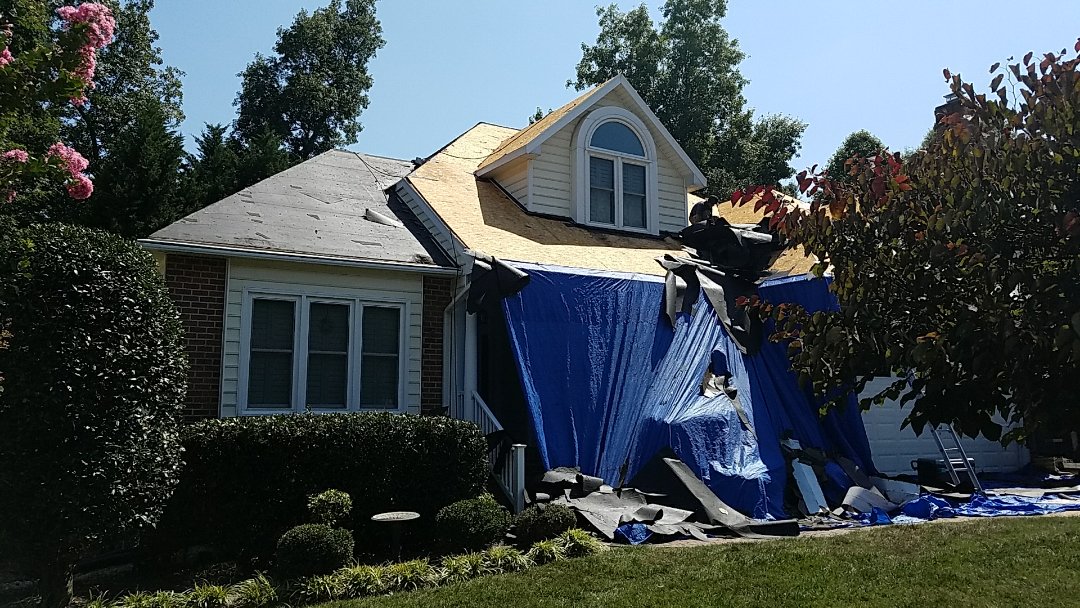 Midlothian, VA - Removing old shingles in preparation for a new GAF roof in Midlothian! Midlothian, VA - Removing old shingles in preparation for a new GAF roof in Midlothian!