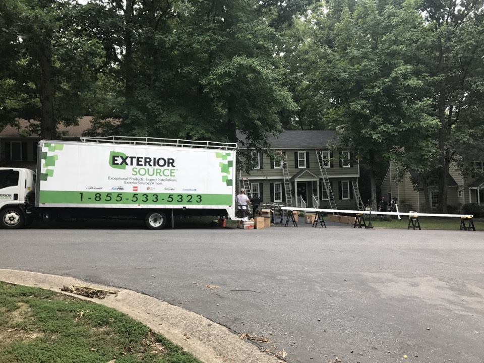 Midlothian, VA - We're installing our LeafGuard Gutter System before it rains. We roll form LeafGuard on site because as you can see here, some runs are longer than our truck! Midlothian, VA - We're installing our LeafGuard Gutter System before it rains. We roll form LeafGuard on site because as you can see here, some runs are longer than our truck!