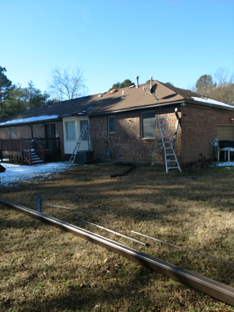 Smithfield, VA - Installing New LeafGuard gutters after we installed fascia and soffit trim wrap Smithfield, VA - Installing New LeafGuard gutters after we installed fascia and soffit trim wrap
