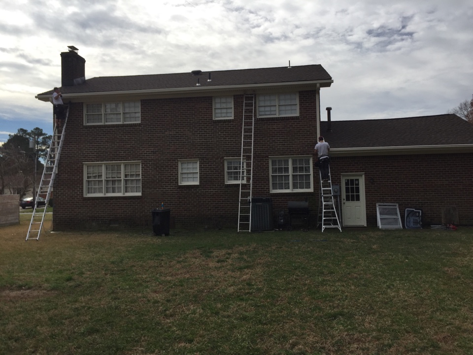 Portsmouth, VA - Finished installing a new GAF roof and now for the finishing touch, new LeafGuard gutters. Portsmouth, VA - Finished installing a new GAF roof and now for the finishing touch, new LeafGuard gutters.