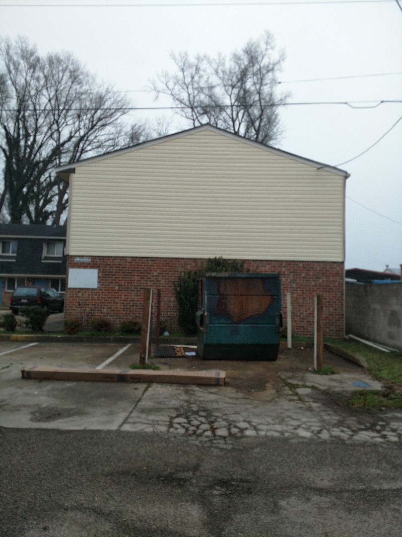 Norfolk, VA - Brand new wall of siding where they had a dumpster fire. New fence, re-supporting and re-surfacing decks starting Monday. Norfolk, VA - Brand new wall of siding where they had a dumpster fire. New fence, re-supporting and re-surfacing decks starting Monday.