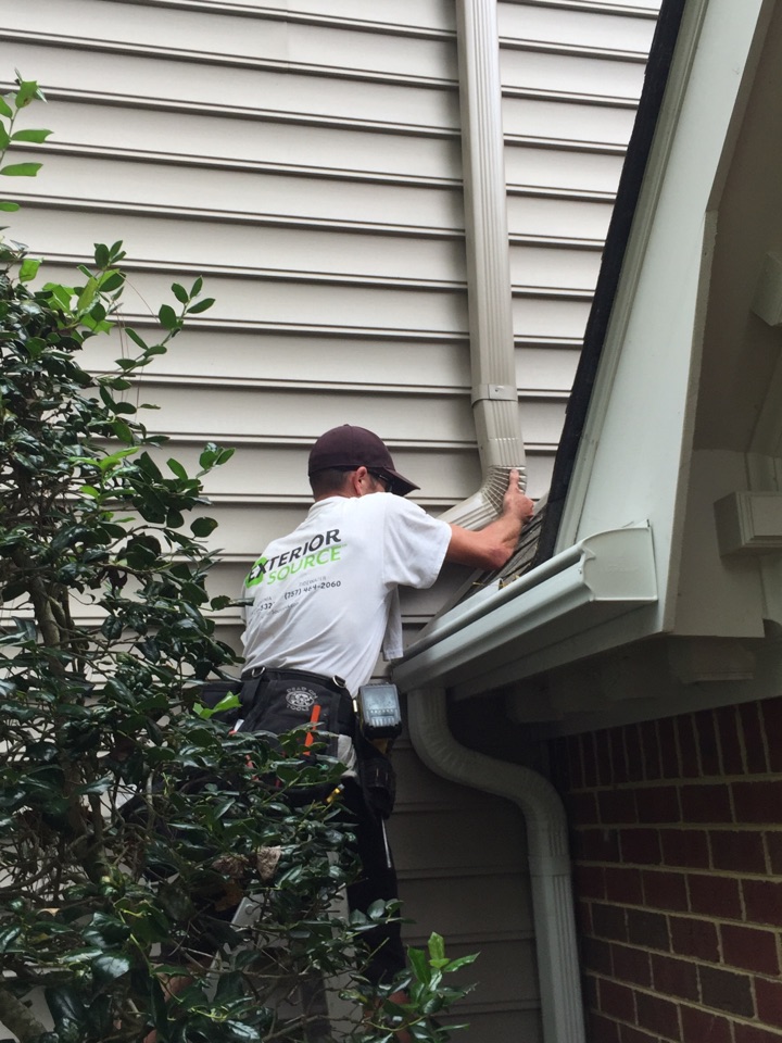 Chesapeake, VA - Installing a hood tap into the LeafGuard gutter system. Chesapeake, VA - Installing a hood tap into the LeafGuard gutter system.