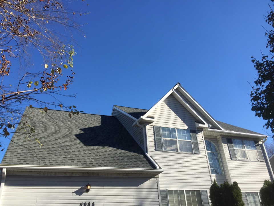 Portsmouth, VA - New PVC gable wrap and new LeafGuard gutters. Portsmouth, VA - New PVC gable wrap and new LeafGuard gutters.