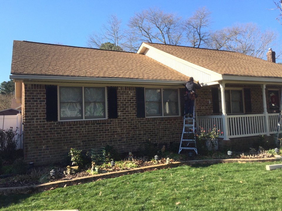 Virginia Beach, VA - Installing the LeafGuard gutter system. Virginia Beach, VA - Installing the LeafGuard gutter system.
