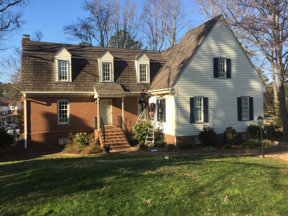 Virginia Beach, VA - Installing new LeafGuard gutters with custom flashing. Virginia Beach, VA - Installing new LeafGuard gutters with custom flashing.