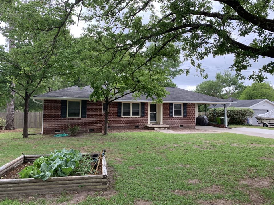 High gloss white 6 inch seamless gutter installation in Forest Acres 