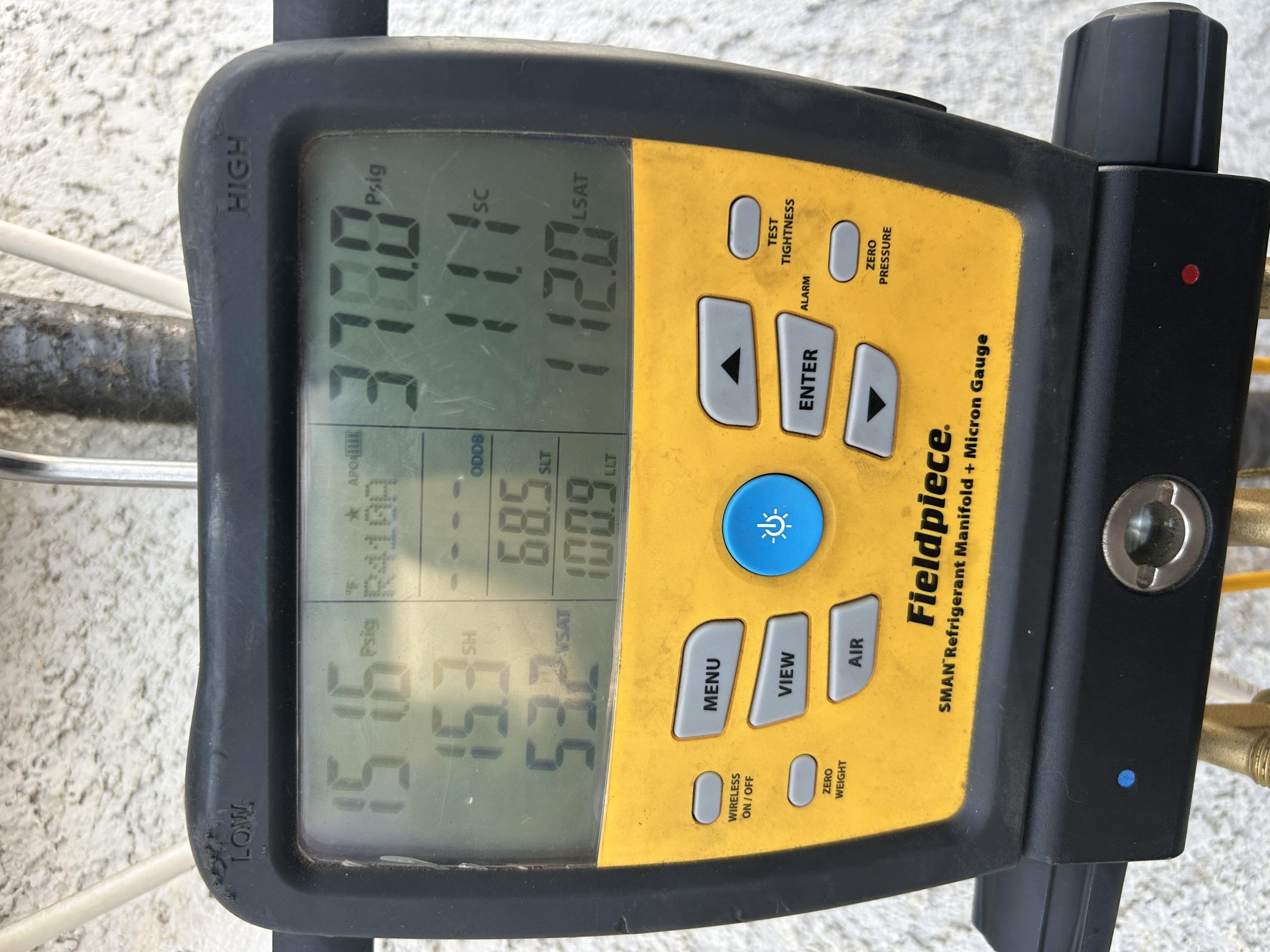 I was tasked with clearing a drainage line, deep cleaning a condensing system with emulsifier acid, extracting the refrigerant charge, flushing the system, and recharging it back to factory specifications. I also had to subcool the system.
