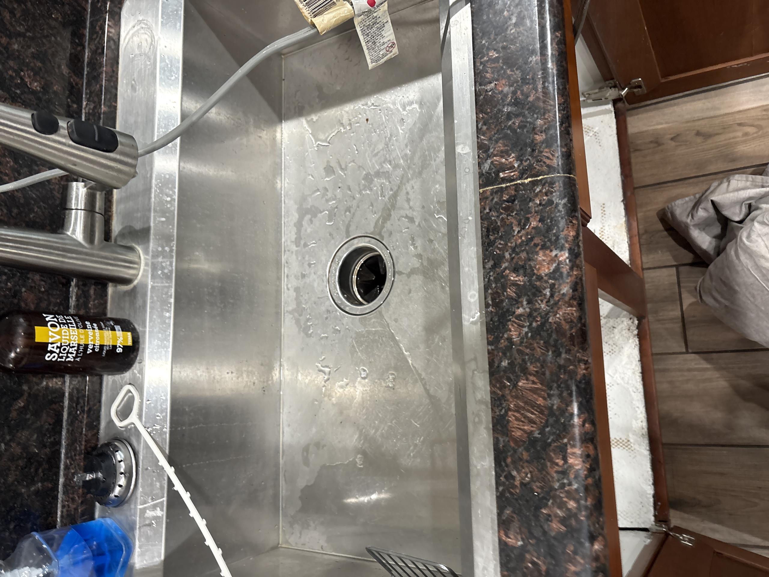 I am a highly skilled and experienced home service professional. I recently completed a kitchen stoppage through clean out access job. The client had a clogged kitchen sink that was causing a significant amount of water damage. I used a plunger and a drain snake to clear the clog, but the blockage was too deep to remove with these tools. I then used a hydro jetter to clean the drain pipe, which successfully cleared the clog. The client was very pleased with the results and thanked me for my help.