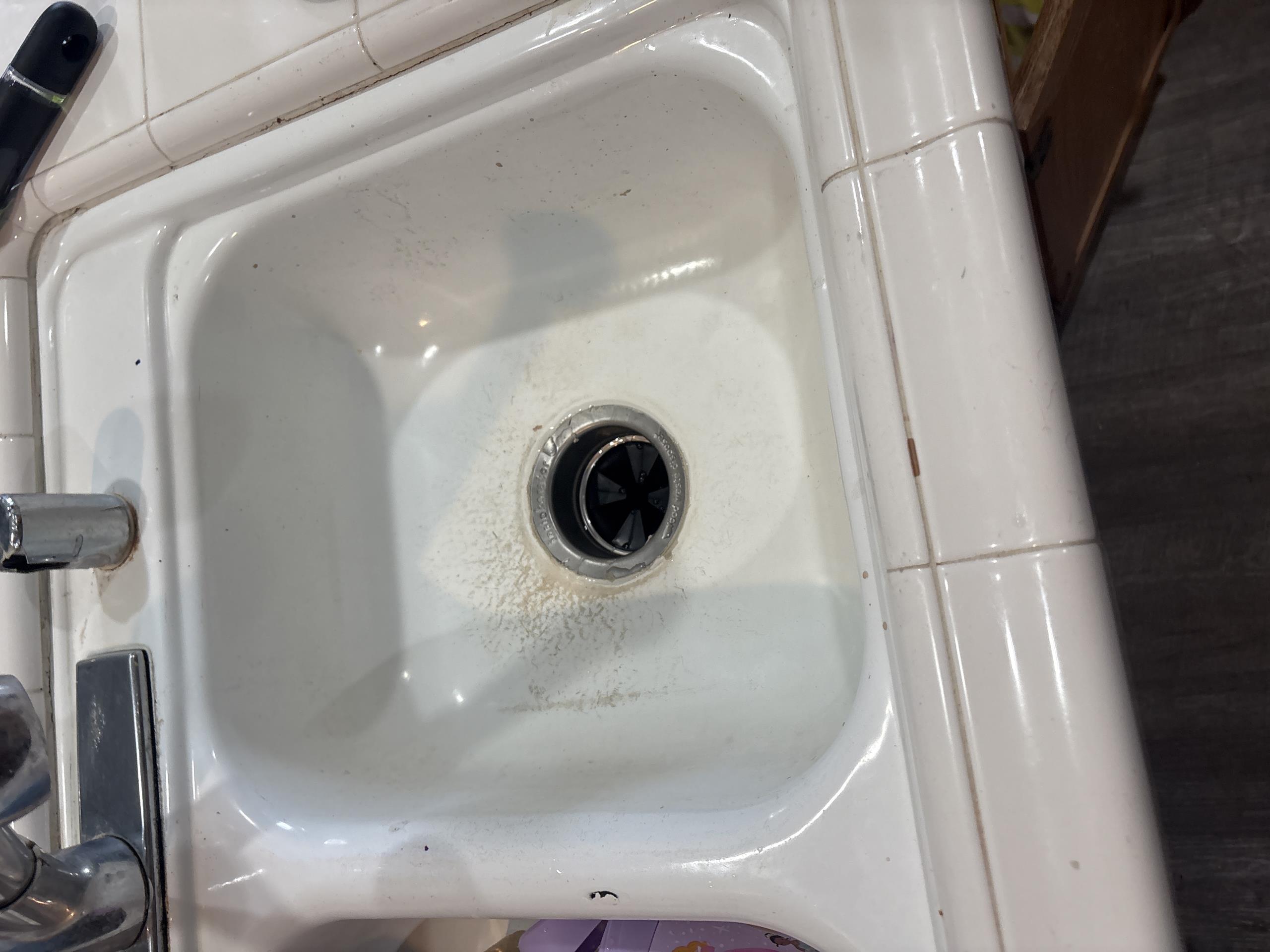 I received a call from a customer who reported a leak beneath their kitchen sink. Upon inspection, it was determined that the leak was originating from the garbage disposal. I will proceed with the installation of a new garbage disposal, which I will supply. This will include a new ring and proper sealing. A one-year warranty will be provided. I conducted tests to ensure it operates effectively.