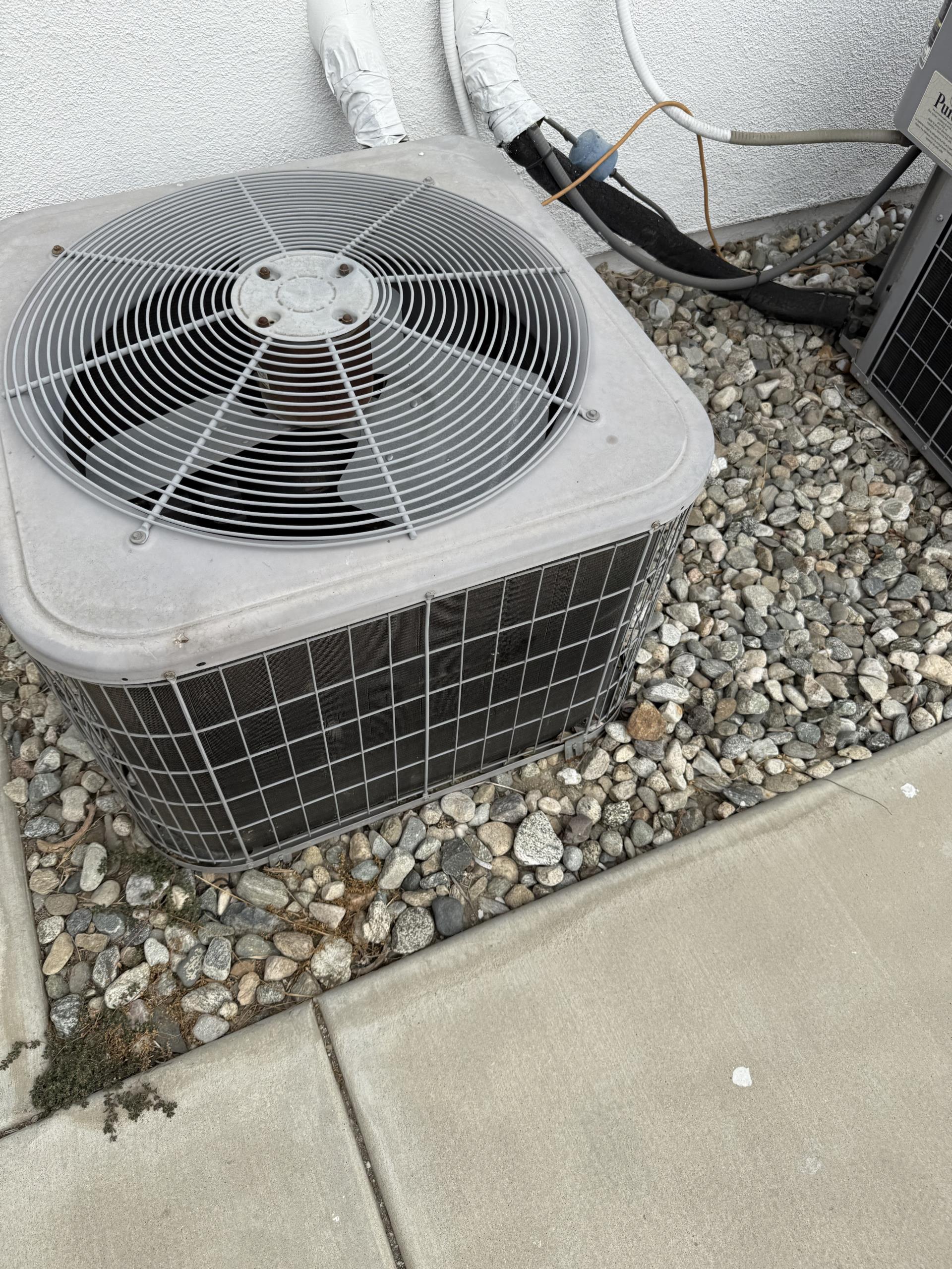 Upon arrival at the customer's home, I checked in with them to discuss the issue they were experiencing with their air conditioning system. They reported that the system was not cooling and required further inspection. I asked them to provide a video of the issue, which showed the condenser fan motor seized and the compressor humming. I informed them that we could replace the condenser fan motor at a specified price. The customer agreed to the price, and I explained that as long as they remain on our maintenance program, they will receive a lifetime warranty on the part we replaced. I then shut off the power, removed the old condenser fan motor and capacitor, installed a new capacitor, wired a new motor, balanced the fan blade, restored power, and tested the system. The customer confirmed that the system was now cooling.