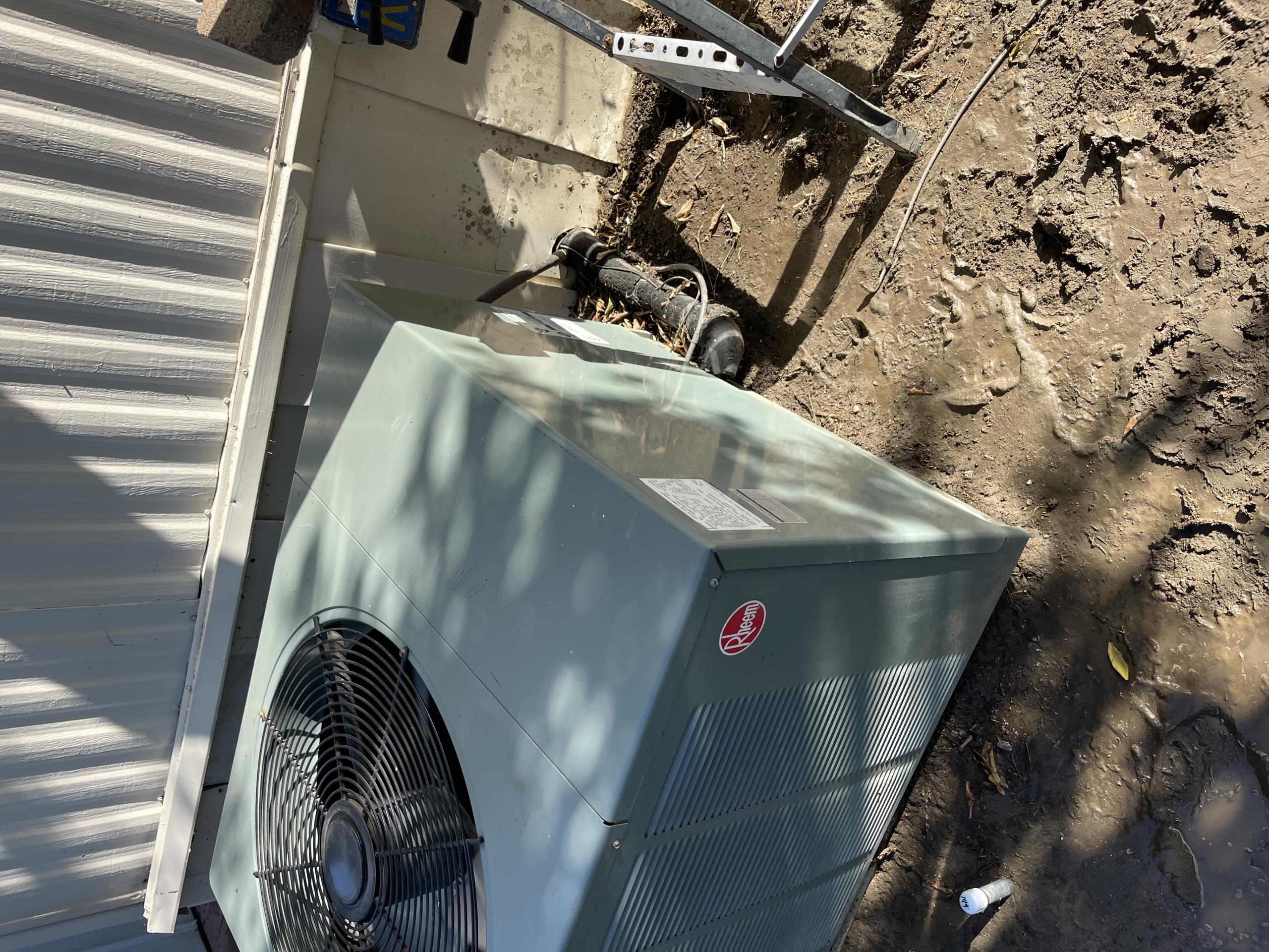 The Rheem unit was manufactured in 2005 and had a cycle in both cooling and heating. The motors were in fair condition, and the washable filter was washed out. Most of the electrical components were within the manufacturer's specifications. The condenser coil was washed out, and the blower wheel compartment was dirty. The added weight will unbalance the blower wheel. The condenser was getting excessively hot, and the blower motor was recommended to be replaced soon.