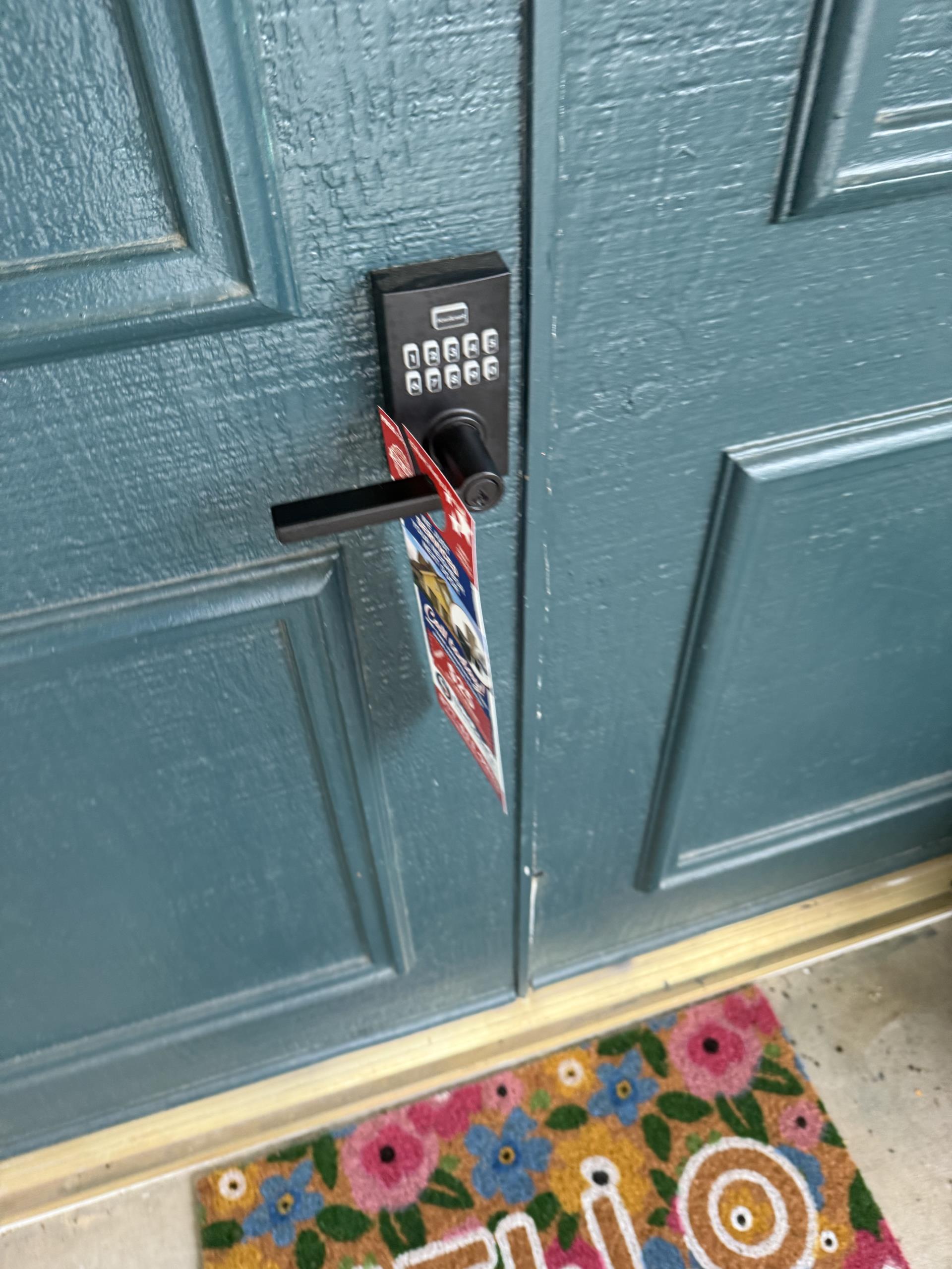 The technician arrived at the customer's house to investigate a cooling issue. The customer reported that the rear end of the house did not receive adequate cooling during a party. The technician activated both systems to examine them. The front unit was found to be adequately charged, but the capacitor showed signs of pitting, leading to a recommendation for its replacement. The condenser fan motor was covered in oil, but there was no play in the shaft. The technician advised replacing the motor due to the loss of lubricant, which could result in overheating and seizing, potentially causing irreversible damage to the compressor and increasing repair costs. The technician verified that the capacitor was within factory specifications and all refrigerant levels were within the acceptable range. The technician then proceeded to the rear unit at the back of the house, where gauges were connected and it was discovered that the system was significantly low on Freon. Power was shut down to ch