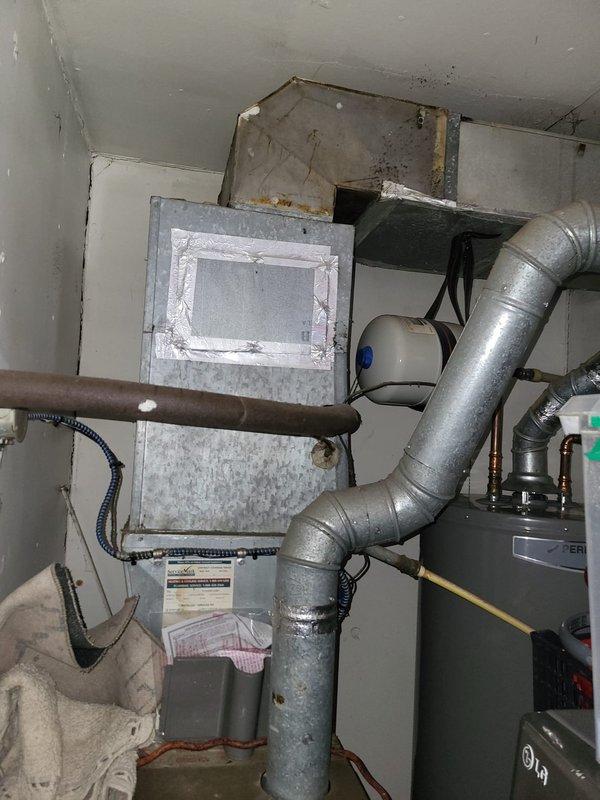 Completed comfort call for customer interested in new HVAC system replacement. Documented existing equipment condition including older air handler with visible wear and dust accumulation, electrical panel with Cutler-Hammer breaker configuration, and current ductwork layout in mechanical room. Customer expressed preference for specific installation technician to perform future system installation work if proceeding with equipment upgrade.