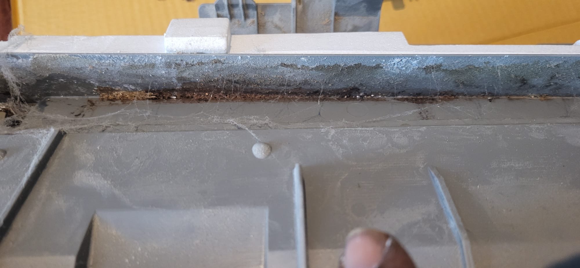 Completed a comprehensive water removal system repair. Evacuated and recovered the R-410A refrigerant, flushed the line set, and removed the failed condensate collection/drain assembly. Accessed the drain line by carefully cutting and removing a section of drywall. Installed a new condensate assembly, flushed the drain line, and verified it was clear and leak-free. Conducted a triple evacuation, achieving a 500 micron vacuum, and recharged with new R-410A refrigerant. Tested the system, ensuring proper operation and performance.