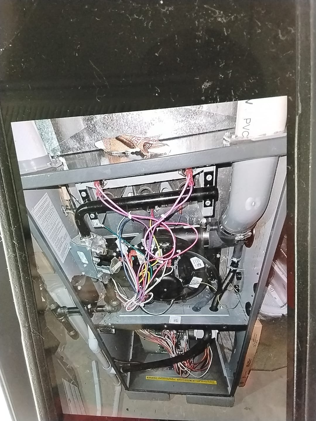 I inspected the indoor unit and ensured the drain was clear. The blower, coil, and furnace were all in good condition. The current filter, a 16x25x1, needed replacement. The customer ordered new filters, which she planned to have her son install the next day. I examined the outdoor unit and discovered a faulty capacitor with a reading of 42/4.7, whereas it should be 50/5. I replaced the capacitor, which was under warranty. After the replacement, I checked the pressures, amps, and performed a megohm test, confirming everything was functioning correctly. I also tightened all electrical connections and rinsed the coil with a hose.